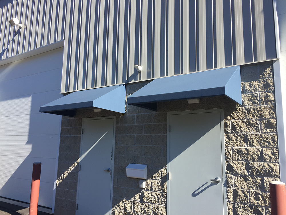 commercial shed style door canopy