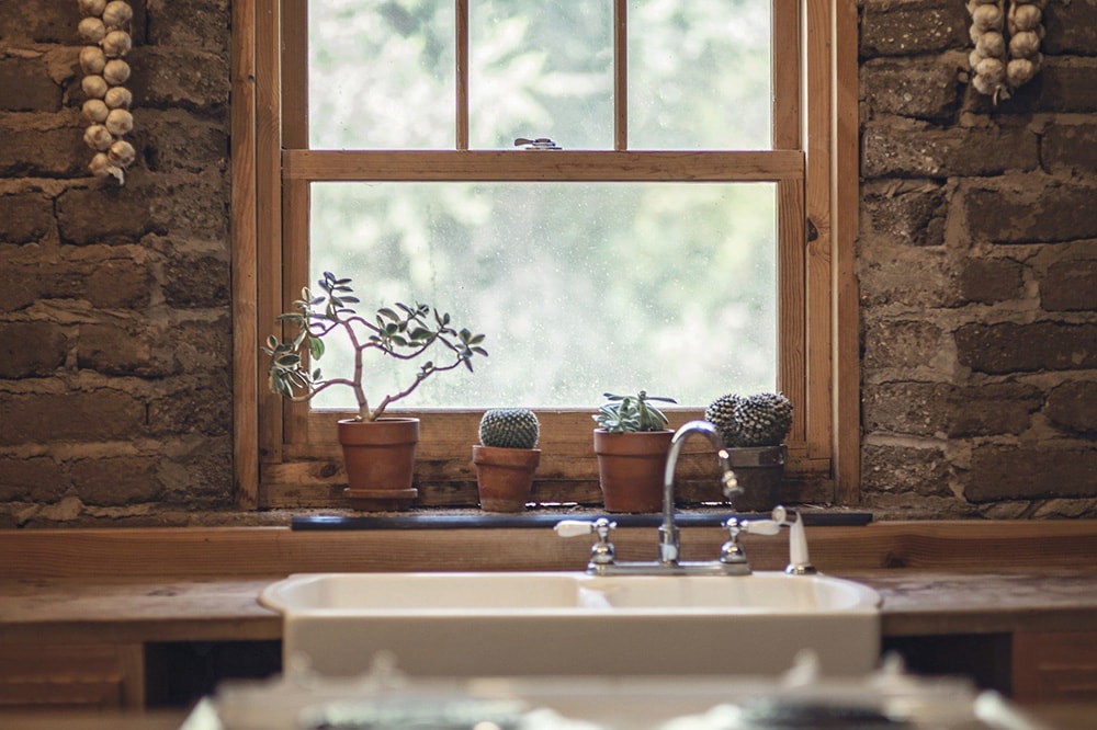 wood framed kitchen window