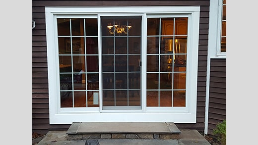 patio doors replaced on wood shingle home