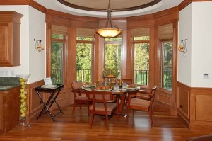 breakfast nook surrounded by large windows