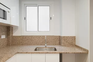 sliding windows above a kitchen sink