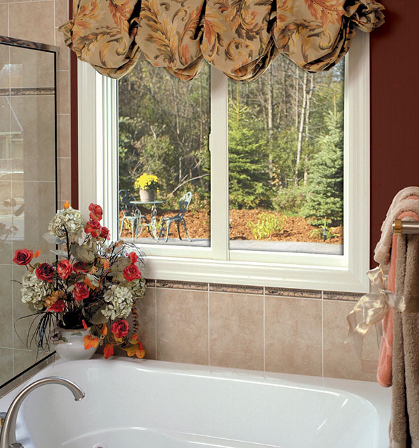 slider window in a red bathroom