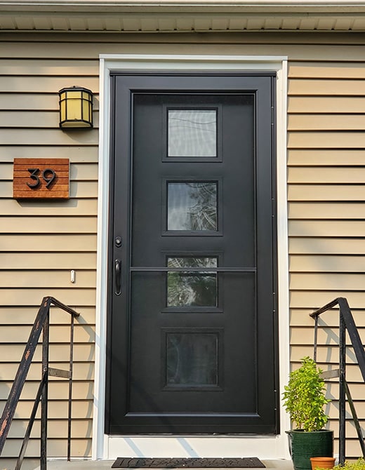black storm door over a black entry door with four windows
