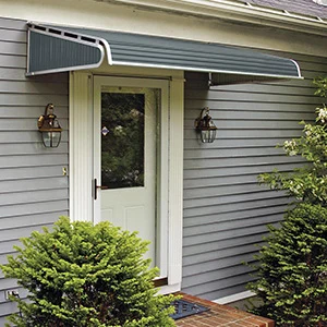 grey aluminum door canopy over a rear entry door