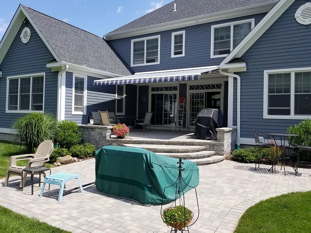 retractable awning installed on rear of home