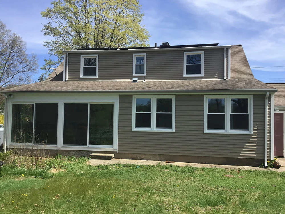 tan brown vinyl siding installation