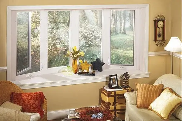 Majestic bow windows in a living room with furniture