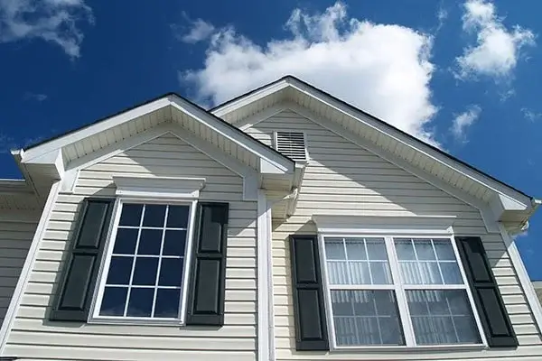 Majestic double hung windows with black shutters