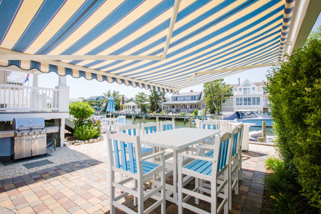 Retractable awning over a deck