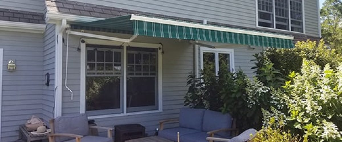 green striped retractable awning