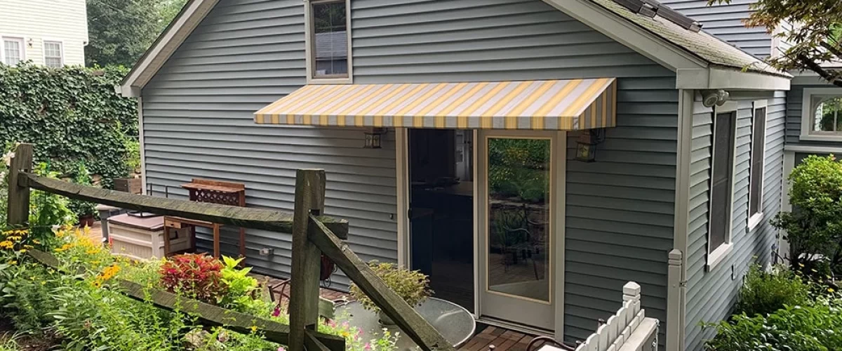 orange striped fabric door canopy covering sliding doors