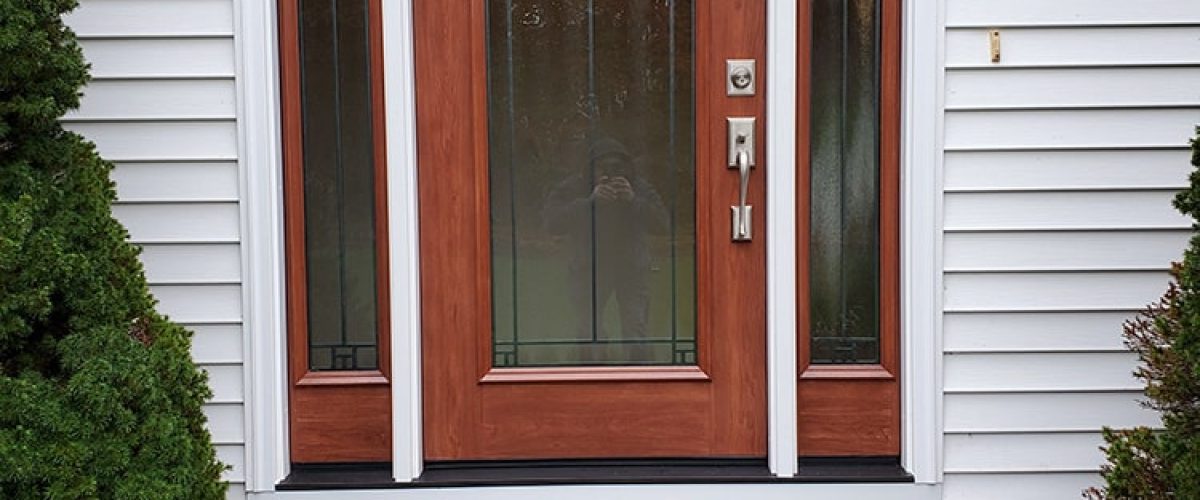 red door replaced on white home