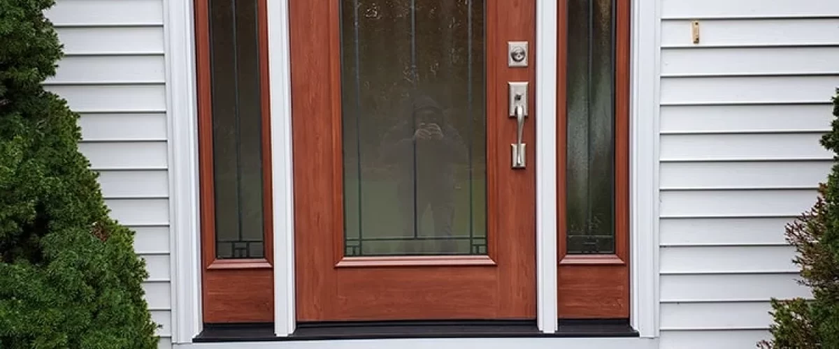 red entry door with full glass side panels