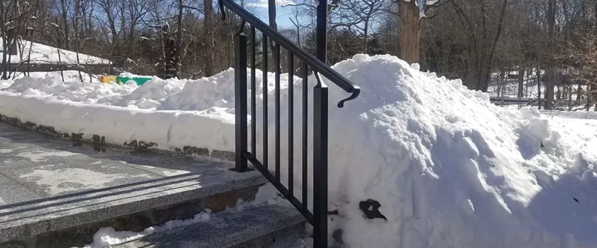 stair railing installed on small landing