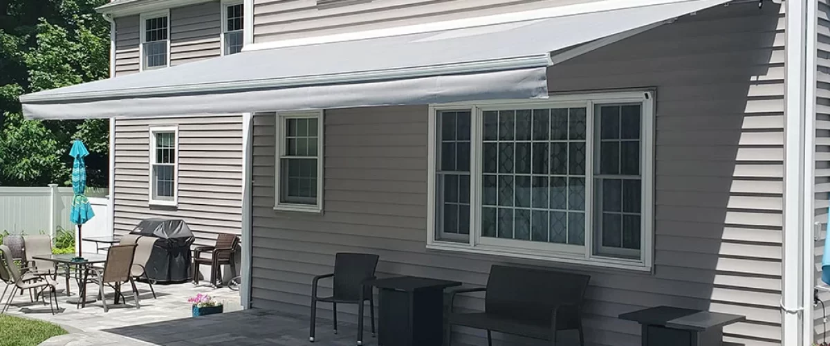 retractable awning covering a pool patio