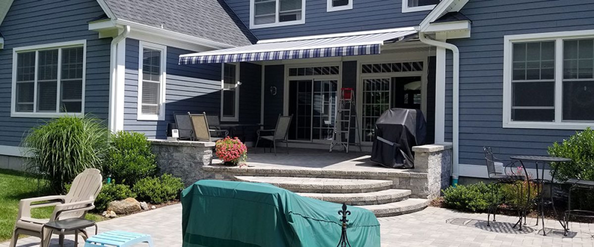 retractable awning installed on rear of home