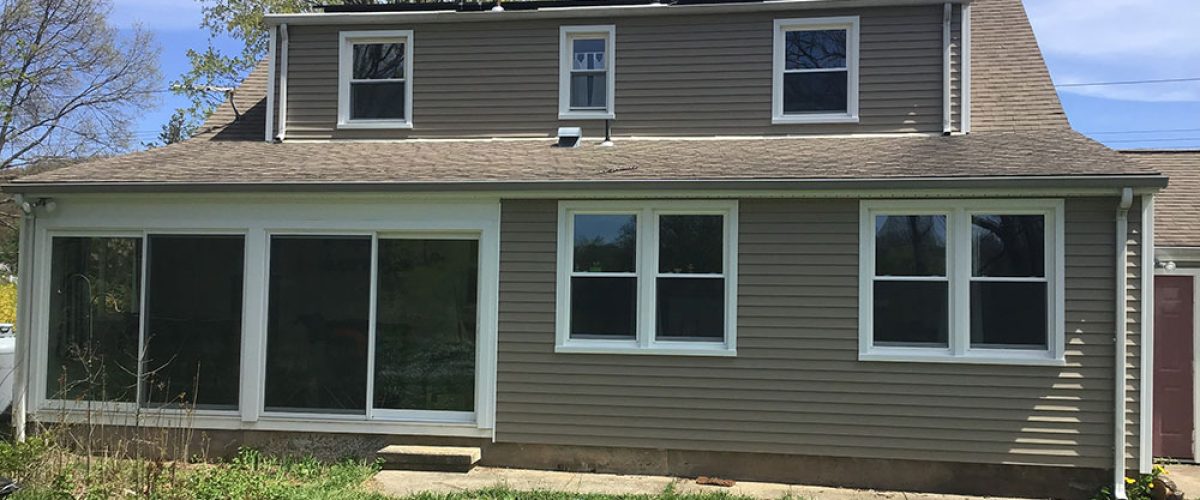 tan brown vinyl siding installation