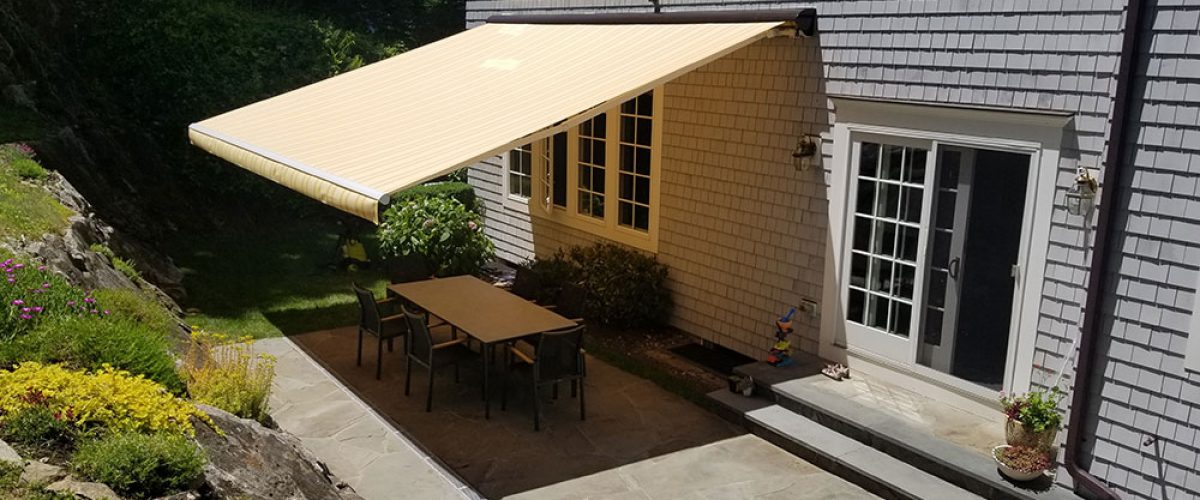retractable awning covering patio area